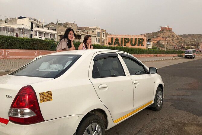 2-Day Private Jaipur City Tour - Day 1: Amer Fort area, Jal Mahal photos, and Jantar Mantar science