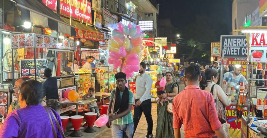 Agra: Sadar Bazar Food Market Night Walking Tour by Tuk-Tuk - Entering Sadar Bazar: narrow streets, shopfront mix, and smart pacing