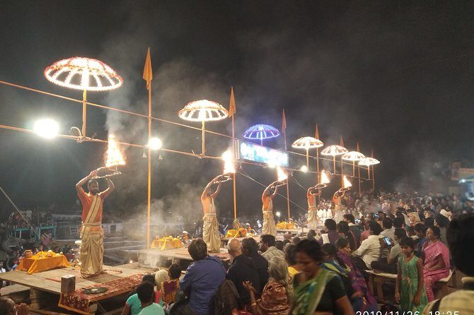 Complete Varanasi Tours - Day 1 evening: Ganga Aarti, burning ghat views, and a boat ride