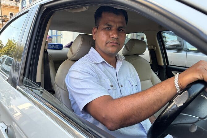 From Agra: Private one way Transfers Cab To Delhi drop - English-Speaking Driver: Small Detail, Big Relief