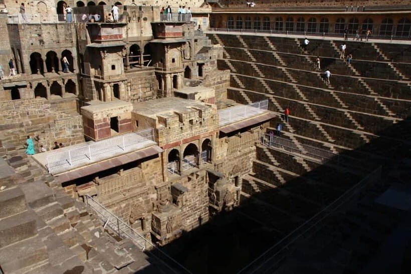From Jaipur: Same Day Trip to Abhaneri Chand Baori Stepwell - Photo strategy, footwear, and temple-smart packing