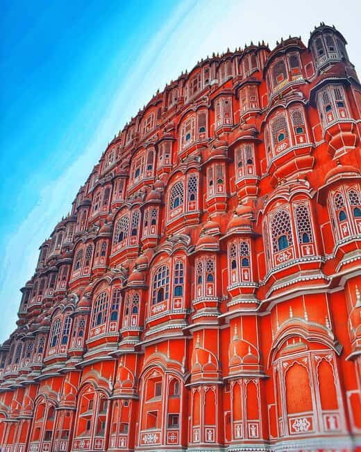 Jaipur: Full Day Sightseeing with Professional Photographer - Getting picked up and staying comfortable in an AC private car
