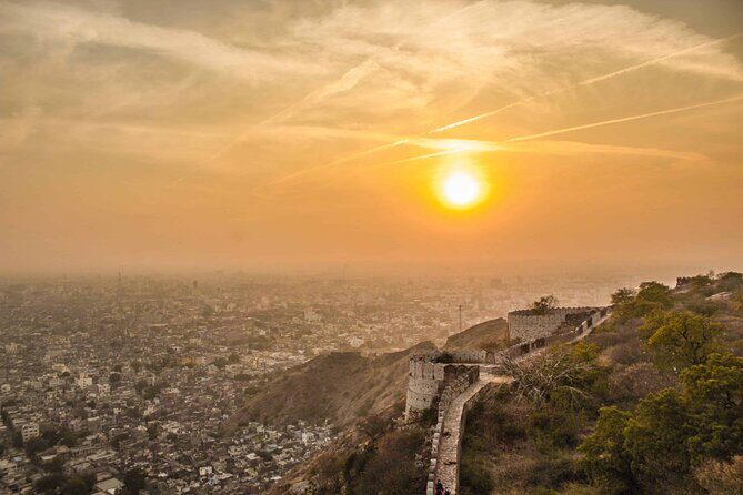 Jaipur Half-Day Evening Tour with Sunset and Dinner - Pickup and first stop: Jal Mahal, the Water Palace on the lake
