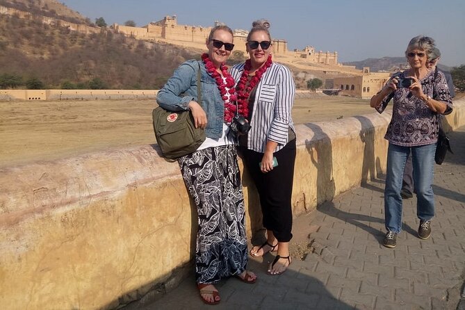 Jaipur Half-Day Tour with Flower Market and Block Printing - Amer and Panna Meena ka Kund: hill-town feel and a stepwell in narrow lanes