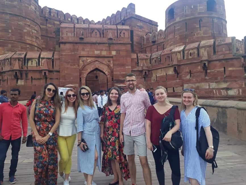 Luxury train tour from Delhi to Agra - Taj Mahal: photo stop, guided facts, and crowd-smart pacing