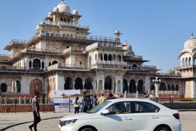 One Day Private Tour of Jaipur with Guide - Getting picked up and moving efficiently with an A/C private car