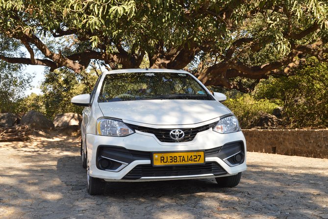 Private A/c Transfer Mount Abu To Udaipur ( 4 Seat A/c Sedan) - Inside the ride: AC comfort, bottled water, and what “private” buys you