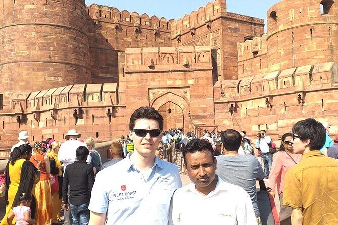 Private Taj Mahal & Agra Day Trip by Car From Delhi All Inclusive - Taj Mahal Timed Right: Tickets, Guide, and the Battery Van