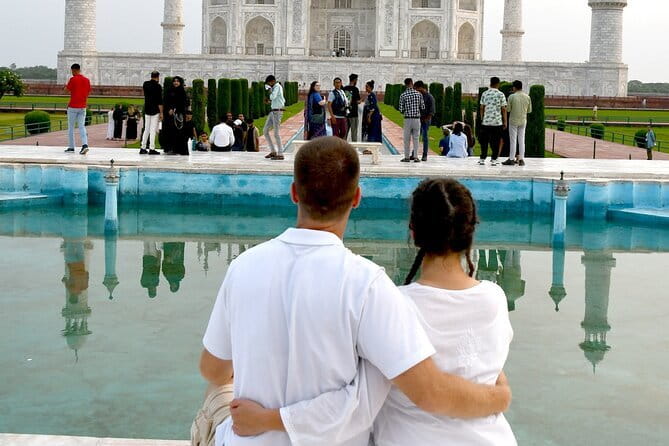 Taj Mahal Sunrise & Agra Day Tour from Delhi with 5<em> Meal – Key Highlights at a Glance’ /></p>
<ul>
<li><strong>Driver pickup anywhere in Delhi, Gurgaon, or Noida</strong> (plus airport as a start option) with door-to-door convenience</li>
<li><strong>Skip-the-ticket-line handling</strong> at both the Taj Mahal and Agra Fort so you keep momentum</li>
<li><strong>UNESCO sights packed in one day</strong>: Taj Mahal, Agra Fort, and the Baby Taj area</li>
<li><strong>English-speaking support</strong> while you’re riding between cities, with help for stops and breaks</li>
<li><strong>Optional 5-star meal time at Courtyard Agra</strong> so you’re not stuck eating on the go</li>
</ul>
<h2 id="the-real-appeal-a-12-hour-day-that-actually-feels-manageable">The Real Appeal: A 12-Hour Day That Actually Feels Manageable</h2>
<p> Meal – The Real Appeal: A 12-Hour Day That Actually Feels Manageable’ /><br />
Delhi to Agra can feel like a logistics puzzle. This tour keeps it simple: you’re picked up, driven in a private car, then greeted by a live guide at each key monument. That matters because India travel can be smoother when you’re not trying to figure out tickets, queues, and meeting points while you’re tired.</p>
<p><p>The schedule is also designed to protect your best time. You don’t just get a drive-by Taj photo. You get a guided visit with time on-site, plus additional historic stops that give your day more shape than a single rushed monument.</p>
</p>
<p><p>Two parts stand out in the practical sense. First, the transport is <strong>private and air-conditioned</strong>, using the Yamuna Expressway route. Second, you’re not on your own at the gates—your guide provides tickets and helps you get inside faster.</p>
</p>
<div style="margin: 20px 0; padding: 15px 0;"><p>You can also read our reviews of more tours and experiences in New Delhi.</p><ul style="margin: 10px 0; padding: 0; list-style: none;"><li style="margin: 0 0 10px 0; padding: 0 0 10px 0; border-bottom: 1px solid #eee; display: flex; align-items: flex-start; gap: 12px; line-height: 1.4;"><a href="https://newdelhitravelguide.com/old-new-delhi-city-tour-half-or-full-day-options-available/" aria-hidden="true" tabindex="-1"><img decoding="async" style="width: 80px; height: 60px; object-fit: cover; border-radius: 4px; flex-shrink: 0;" src="https://a.newdelhitravelguide.com/wp-content/uploads/old-new-delhi-city-tour-half-or-full-day-options-available-150x150.jpg" alt="" loading="lazy"></a><div><a href="https://newdelhitravelguide.com/old-new-delhi-city-tour-half-or-full-day-options-available/">Old & New Delhi City Tour – Half or Full Day Options Available</a><br><span style="font-size: 0.82em; color: #555; margin-top: 2px;"><span style="color: #f5a623;">★</span> 5.0 &middot; 4,811 reviews</span></div></li><li style="margin: 0 0 10px 0; padding: 0 0 10px 0; border-bottom: 1px solid #eee; display: flex; align-items: flex-start; gap: 12px; line-height: 1.4;"><a href="https://newdelhitravelguide.com/same-day-taj-mahal-agra-fort-baby-taj-tour-from-delhi-by-car/" aria-hidden="true" tabindex="-1"><img decoding="async" style="width: 80px; height: 60px; object-fit: cover; border-radius: 4px; flex-shrink: 0;" src="https://a.newdelhitravelguide.com/wp-content/uploads/same-day-taj-mahal-agra-fort-baby-taj-tour-from-delhi-by-car-150x150.jpg" alt="" loading="lazy"></a><div><a href="https://newdelhitravelguide.com/same-day-taj-mahal-agra-fort-baby-taj-tour-from-delhi-by-car/">Same Day Taj Mahal, Agra Fort & Baby Taj Tour from Delhi by Car</a><br><span style="font-size: 0.82em; color: #555; margin-top: 2px;"><span style="color: #f5a623;">★</span> 5.0 &middot; 4,304 reviews</span></div></li><li style="margin: 0; padding: 0; border-bottom: none; display: flex; align-items: flex-start; gap: 12px; line-height: 1.4;"><a href="https://newdelhitravelguide.com/taj-mahal-day-tour-from-delhi-by-superfast-train-top-rated-tour/" aria-hidden="true" tabindex="-1"><img decoding="async" style="width: 80px; height: 60px; object-fit: cover; border-radius: 4px; flex-shrink: 0;" src="https://a.newdelhitravelguide.com/wp-content/uploads/taj-mahal-day-tour-from-delhi-by-superfast-train-top-rated-tour-150x150.jpg" alt="" loading="lazy"></a><div><a href="https://newdelhitravelguide.com/taj-mahal-day-tour-from-delhi-by-superfast-train-top-rated-tour/">Taj Mahal Day Tour from Delhi by Superfast Train – TOP RATED TOUR</a><br><span style="font-size: 0.82em; color: #555; margin-top: 2px;"><span style="color: #f5a623;">★</span> 5.0 &middot; 4,166 reviews</span></div></li></ul></div><h2 id="pickup-and-the-3-hour-yamuna-expressway-ride">Pickup and the 3-Hour Yamuna Expressway Ride</h2>
<p><img width="669" height="446" decoding="async" src=