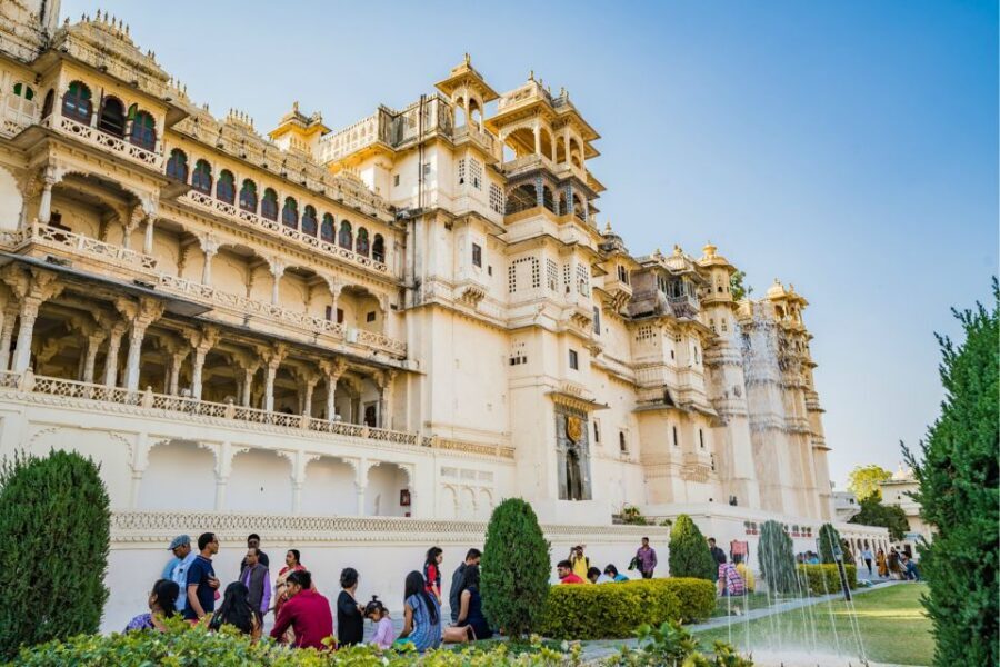 Udaipur: Full Day Private City Tour with Optional Boat Ride - Udaipur City Palace: museum rooms, old walls, and the photo fee