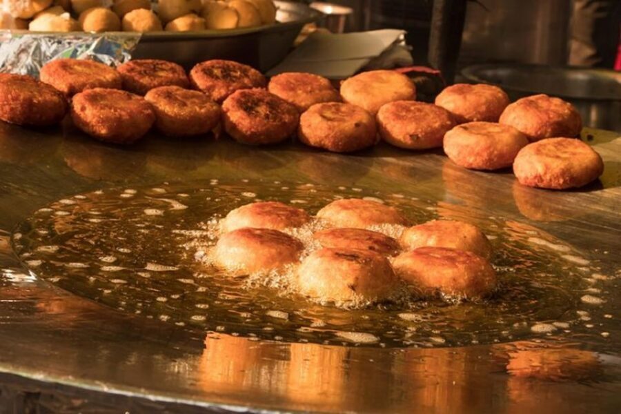 Udaipur: Guided Street Food Tour with Tastings - Watching an oldest food shop keep the flavor going