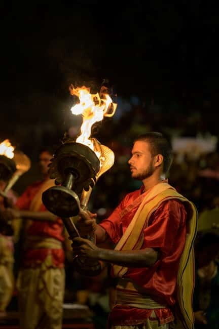 Varanasi Landmark Evening City Tour - Aarti & Boating - Manikarnika Ghat: a respectful look at cremation rituals