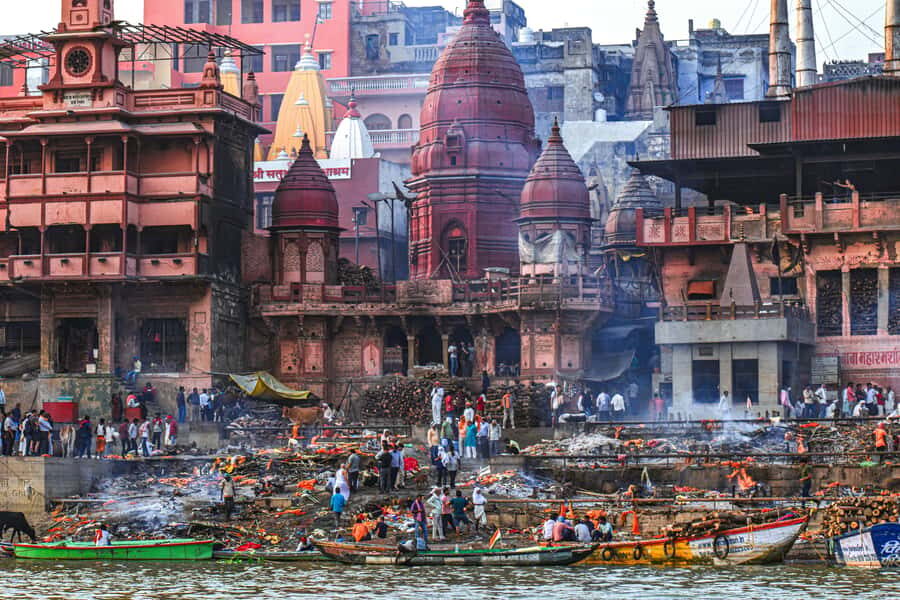 Varanasi: Sunrise walking tour with Chai & Arti Ceremony - The sunrise boat ride on the Ganges: best views, real-life caveats