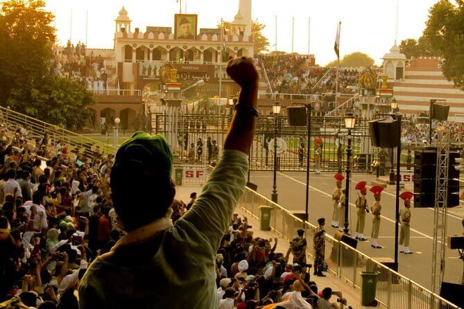 Wagah Border Ceremony Booking - What you’ll see at Wagah: drills, synchronized flags, and cheering at sundown